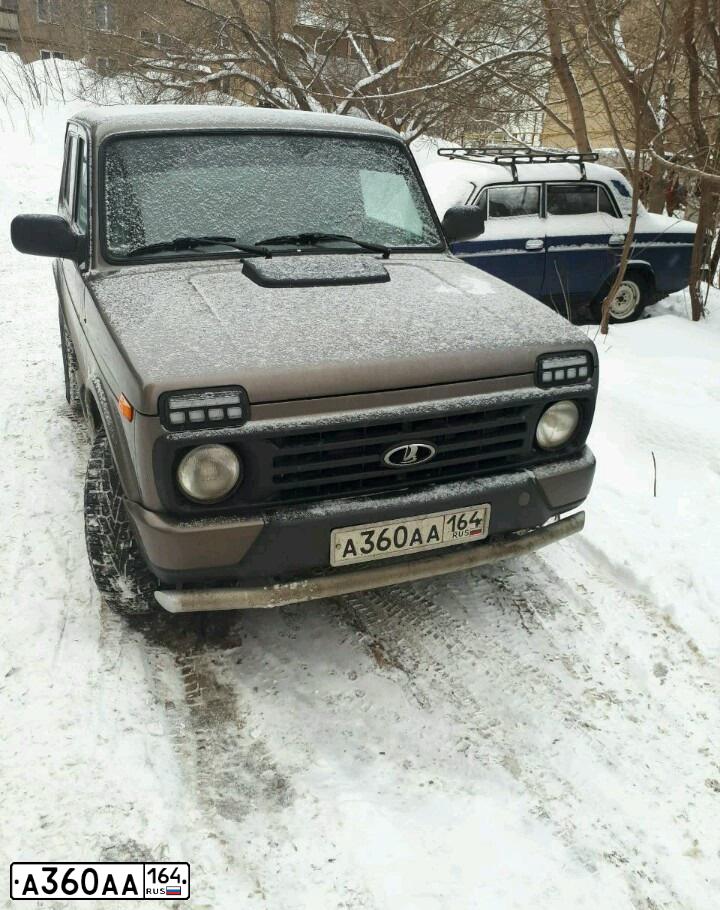 Фото автомобиля LADA 2121 NIVA, 2015 — госномер В251ВР164. Цвет: Золотисто-коричневый