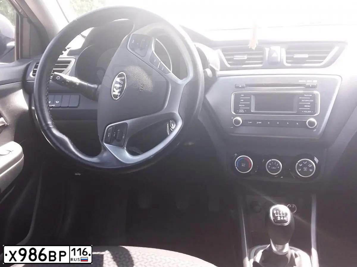 Фото автомобиля KIA RIO, 2015 — госномер К746КК12. Цвет: ТЕМНО-СЕРЫЙ