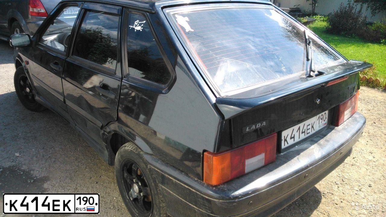 Фото автомобиля LADA 2114 SAMARA, 2009 — госномер К414ЕК190. Цвет: ЧЕРНЫЙ