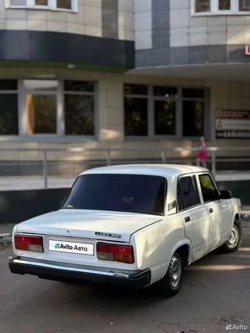 Фото автомобиля LADA 2107, 2011 — госномер Р991АА977. Цвет: Белый