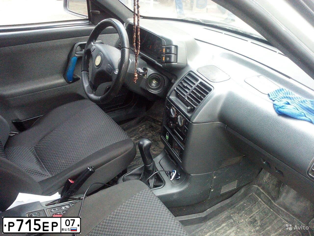 Фото автомобиля LADA 2112, 2002 — госномер Р715ЕР07. Цвет: СВЕТЛО-СЕРЕБРИСТЫЙ МЕТАЛ
