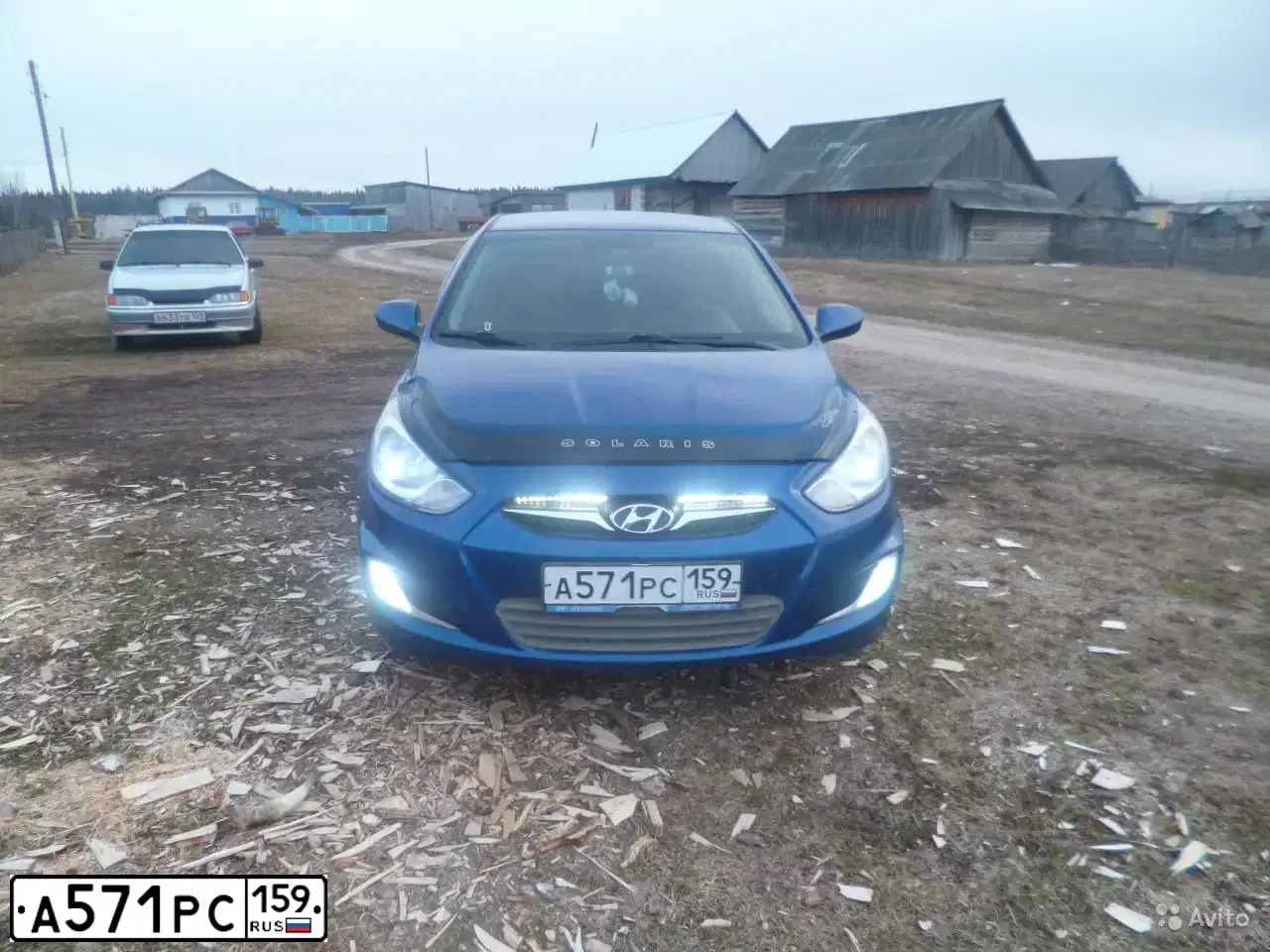 Фото автомобиля HYUNDAI SOLARIS, 2011 — госномер Е083ХО159. Цвет: ТЕМНО-СИНИЙ