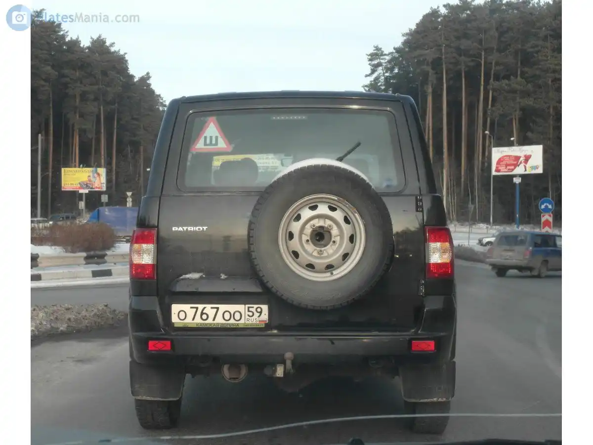 Фото автомобиля VAZ 2121 NIVA, 1997 — госномер О767ОО59. Цвет: САФАРИ