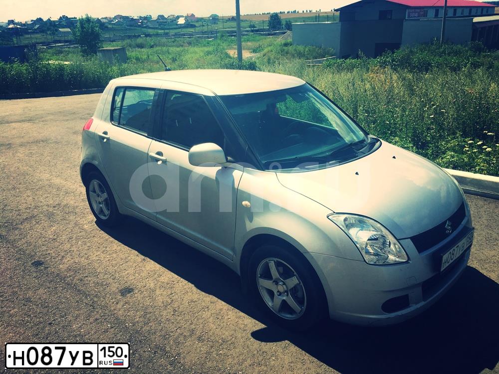 Фото автомобиля SUZUKI SWIFT, 2006 — госномер Х148АТ136. Цвет: СЕРЫЙ