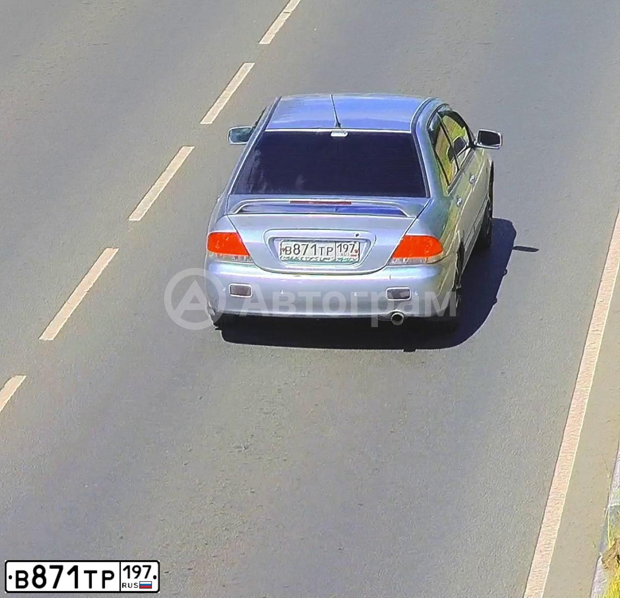 Фото автомобиля MITSUBISHI LANCER, 2004 — госномер В871ТР197. Цвет: СВЕТЛО-СЕРЫЙ