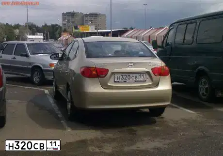 Фото автомобиля HYUNDAI ELANTRA, 2008 — госномер Т073КУ71. Цвет: ЖЕЛТО-ПЕСОЧНЫЙ