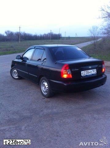 Фото автомобиля TAGAZ ACCENT, 2007 — госномер Е238НО161. Цвет: ЧЕРНЫЙ