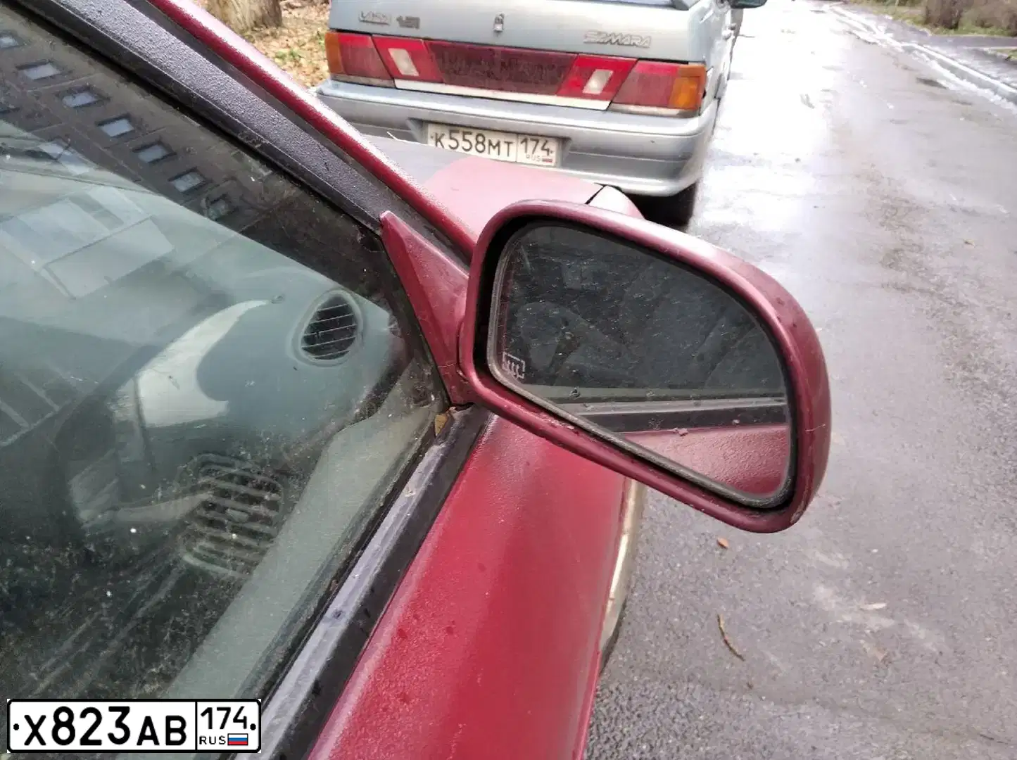 Фото автомобиля MITSUBISHI LANCER, 1994 — госномер Х823АВ174. Цвет: Красный (вишневый)