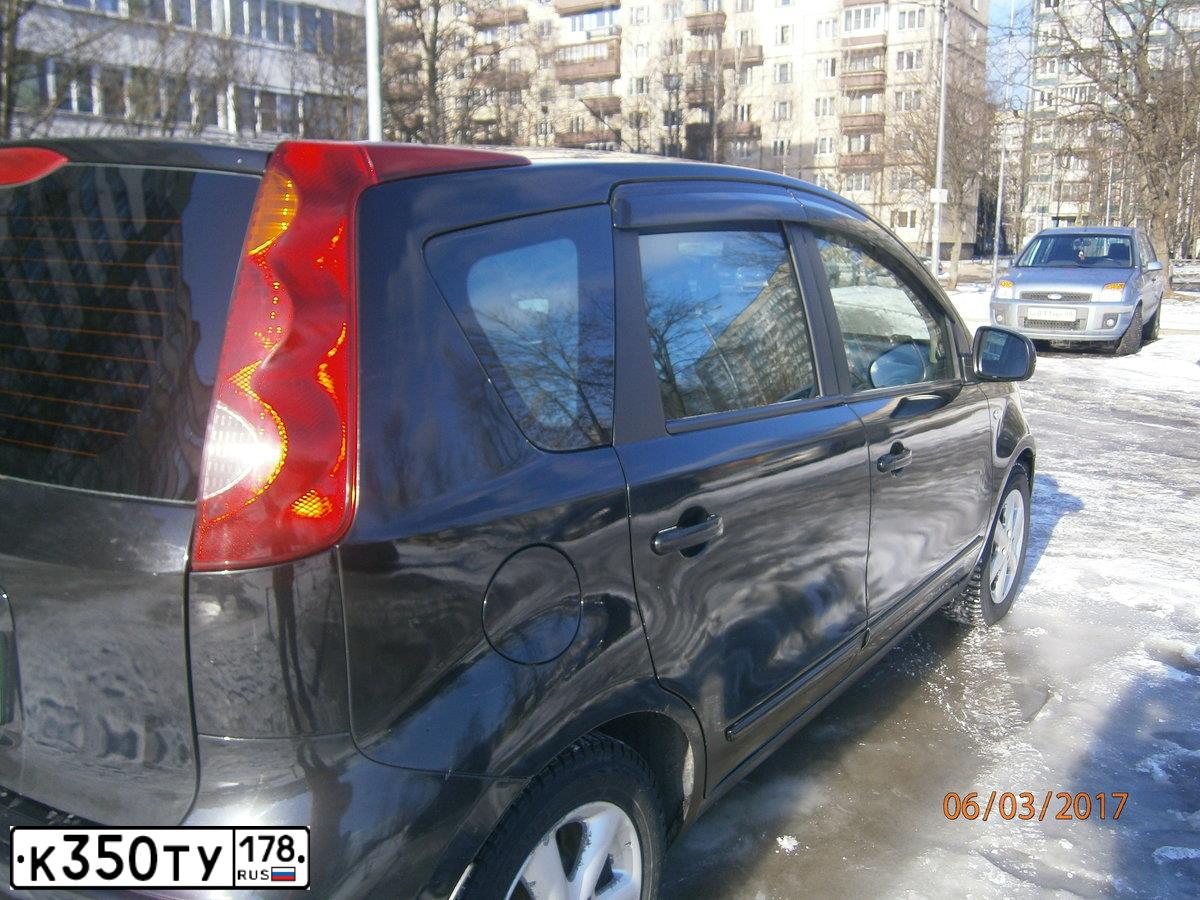 Фото автомобиля NISSAN NOTE, 2006 — госномер В911ТО198. Цвет: ЧЕРНЫЙ