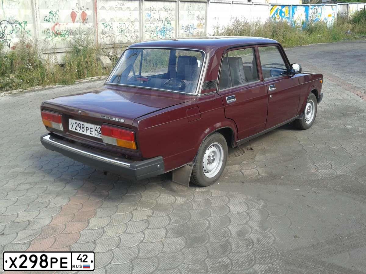 Фото автомобиля LADA 2107 LADA, 2006 — госномер У933ЕЕ142. Цвет: ТЕМНО-ВИШНЕВЫЙ