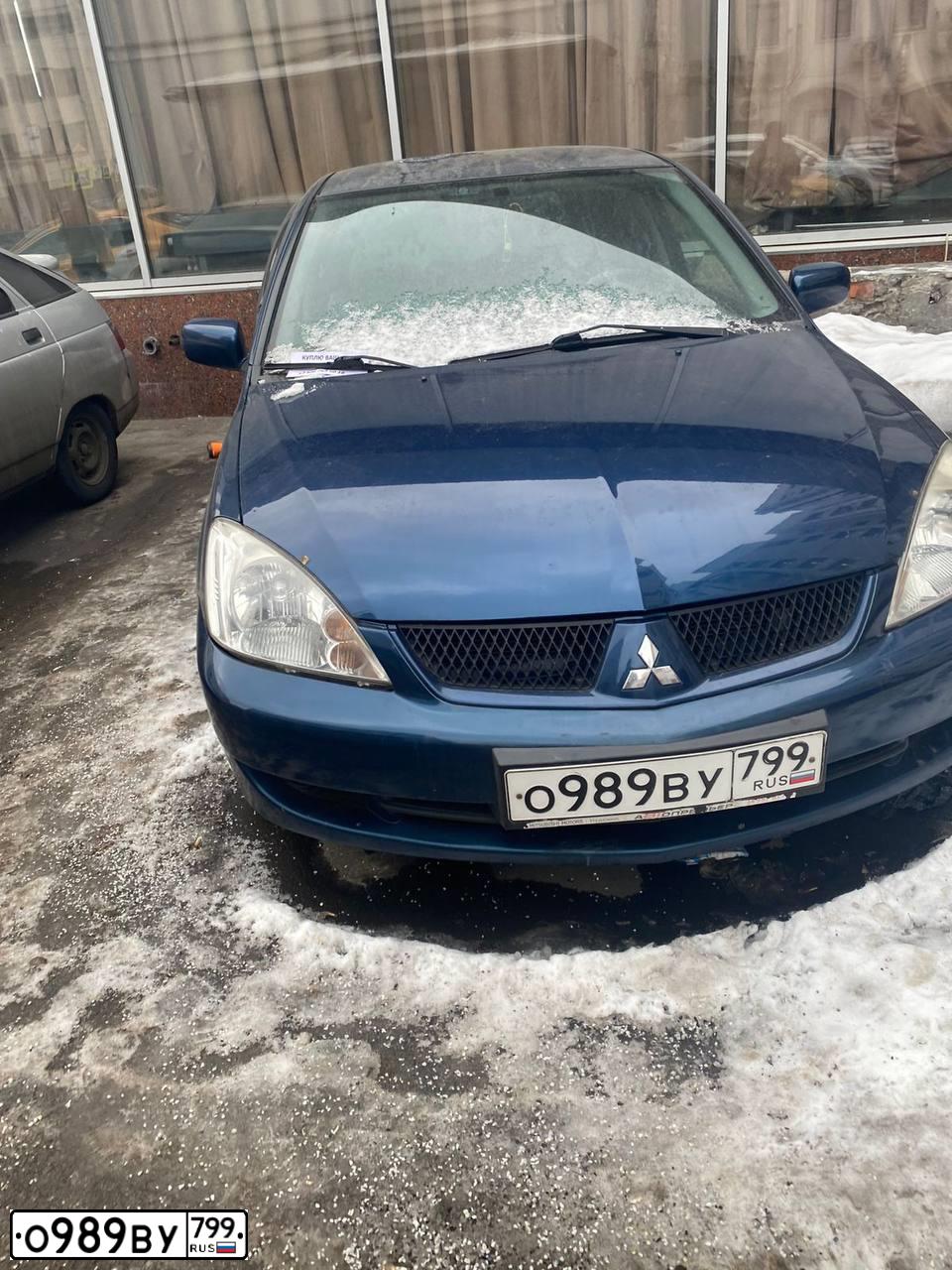 Фото автомобиля MITSUBISHI LANCER, 2007 — госномер О989ВУ799. Цвет: СИНИЙ