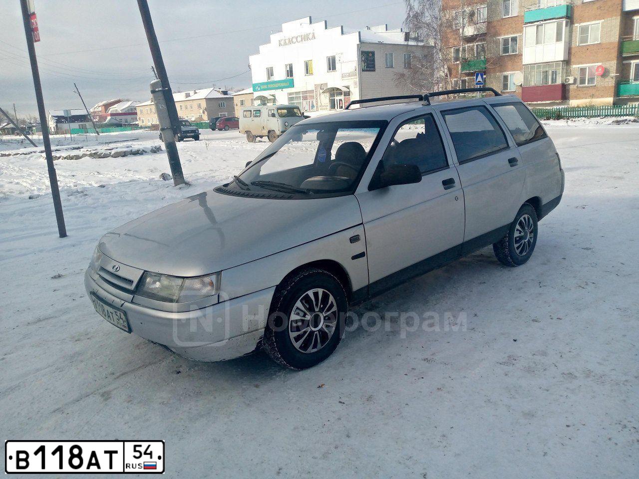 Фото автомобиля LADA 2111, 2002 — госномер Р394УА154. Цвет: СВ СЕРЕБРИСТЫЙ МЕТАЛЛИК