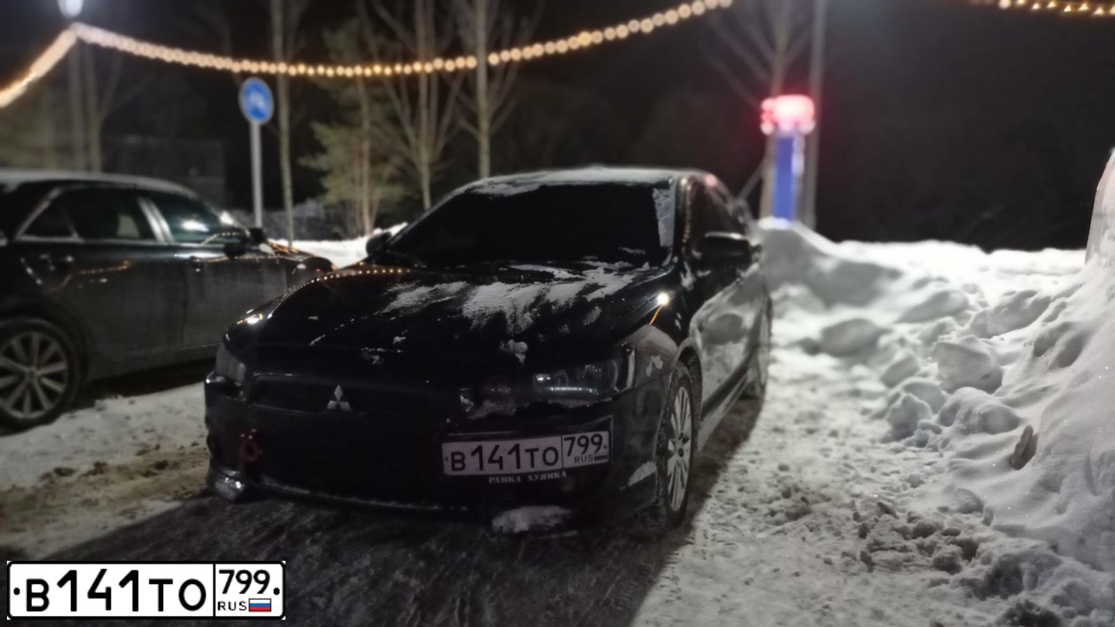 Фото автомобиля MITSUBISHI LANCER, 2008 — госномер В141ТО799. Цвет: ЧЕРНЫЙ