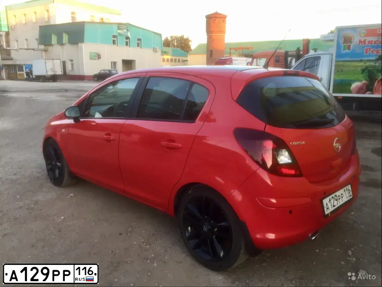 Фото автомобиля OPEL CORSA, 2011 — госномер А129РР116. Цвет: Красный