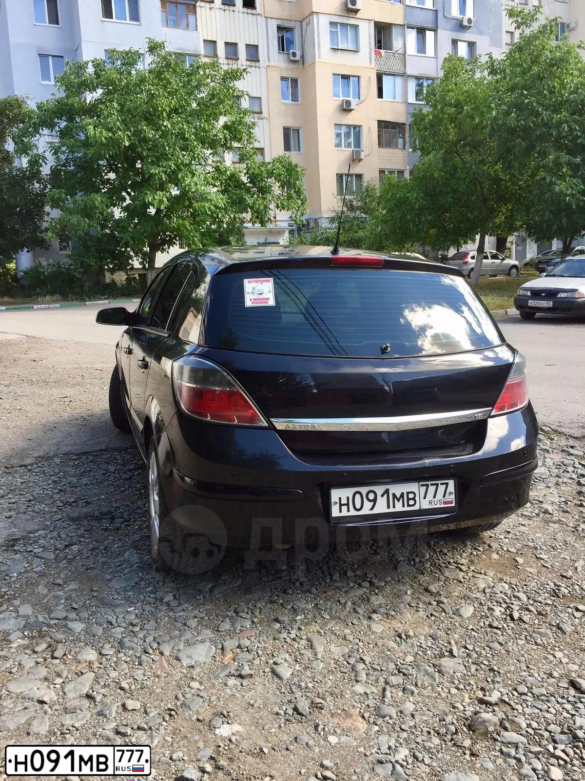 Фото автомобиля OPEL ASTRA, 2008 — госномер Т008ТЕ197. Цвет: ЧЕРНЫЙ