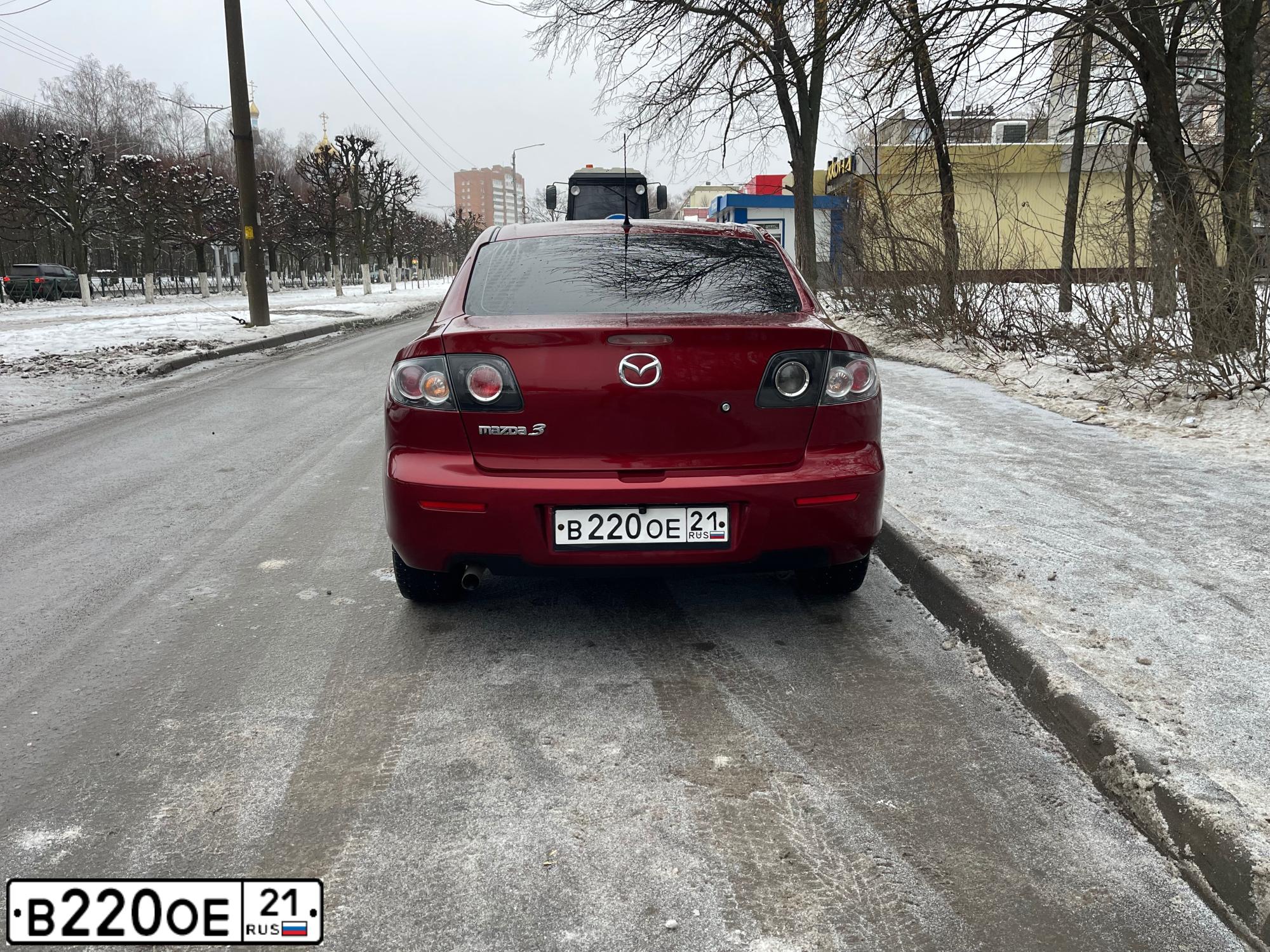 Фото автомобиля MAZDA 3, 2008 — госномер В220ОЕ21. Цвет: КРАСНЫЙ