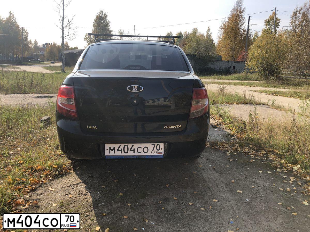 Фото автомобиля TOYOTA CAMRY, 2010 — госномер Е734ОР70. Цвет: ЧЕРНЫЙ