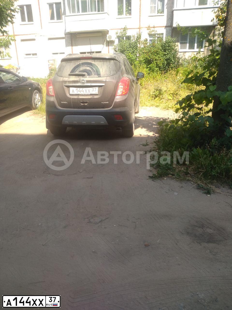 Фото автомобиля OPEL MOKKA, 2014 — госномер А144ХХ37. Цвет: Коричневый