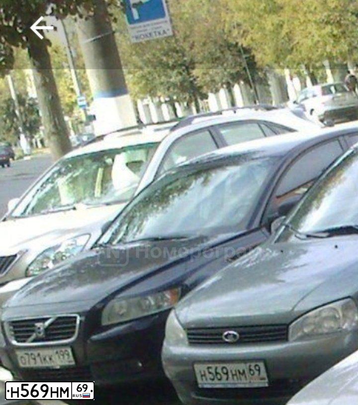 Фото автомобиля LADA 1117 KALINA, 2009 — госномер Н569НМ69. Цвет: ТЕМНО СЕРЫЙ МЕТАЛЛИК
