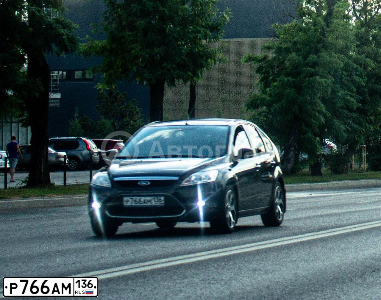 Фото автомобиля FORD FOCUS, 2011 — госномер Р766АМ136. Цвет: ЧЕРНЫЙ
