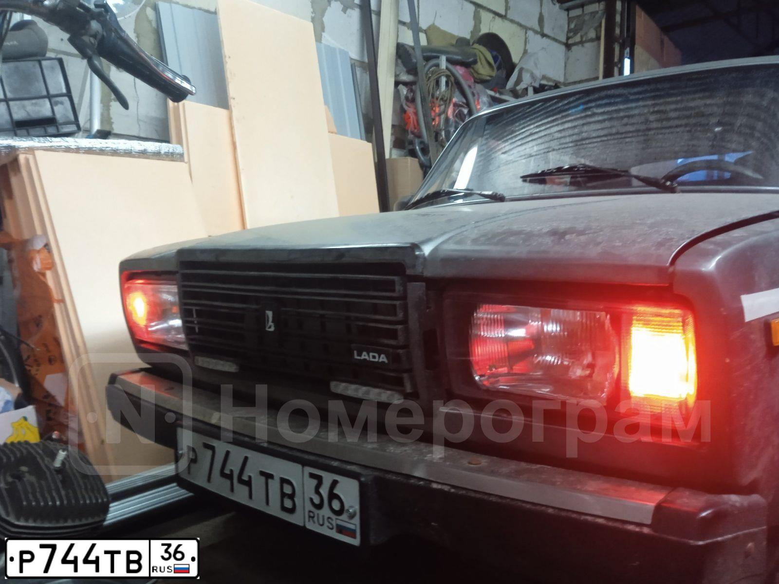 Фото автомобиля LADA 2107, 2011 — госномер Р744ТВ36. Цвет: СЕРО-ЗЕЛЕНЫЙ МЕТАЛЛИК
