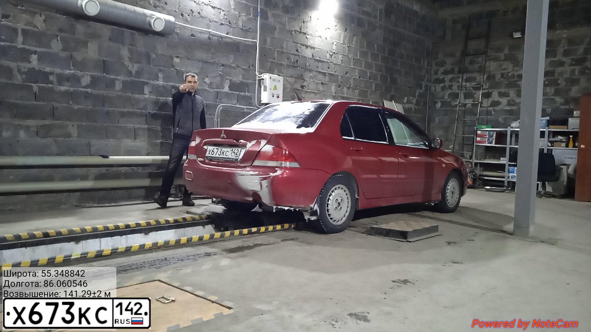 Фото автомобиля MITSUBISHI LANCER, 2003 — госномер Х673КС142. Цвет: Красный