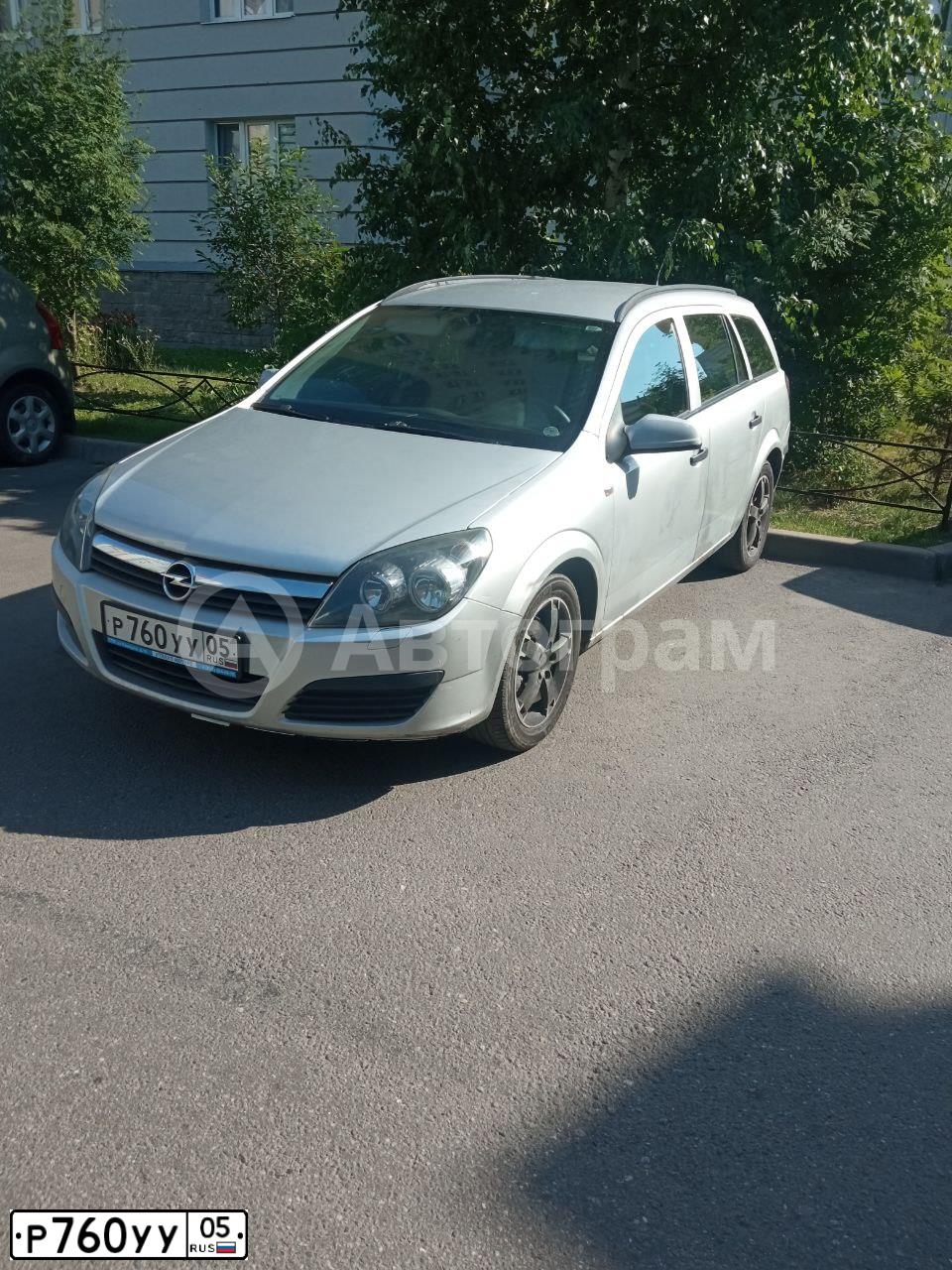 Фото автомобиля OPEL ASTRA CARAVAN, 2005 — госномер Т723АМ198. Цвет: Серебристый