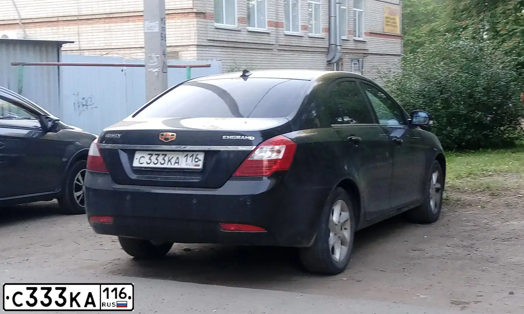 Фото автомобиля GEELY EMGRAND (FE-1), 2012 — госномер С994ХК716. Цвет: ЧЕРНЫЙ