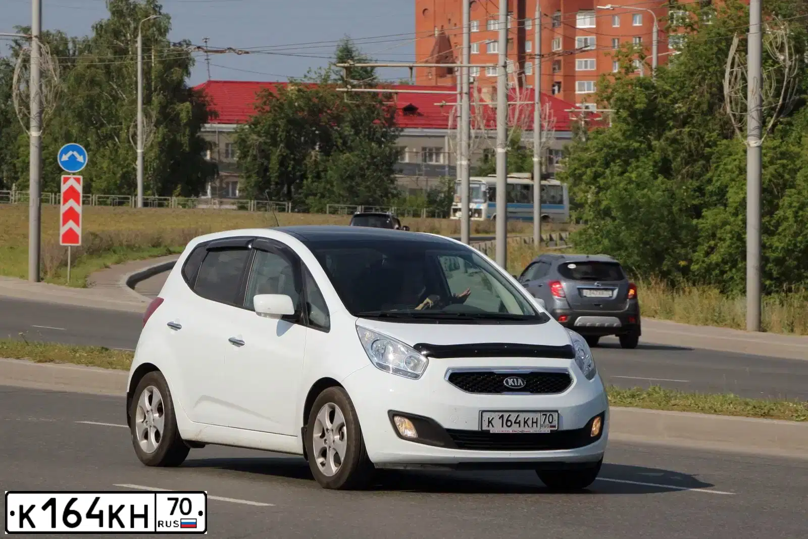 Фото автомобиля FORD FUSION, 2006 — госномер К164НМ70. Цвет: СЕРЕБРИСТЫЙ
