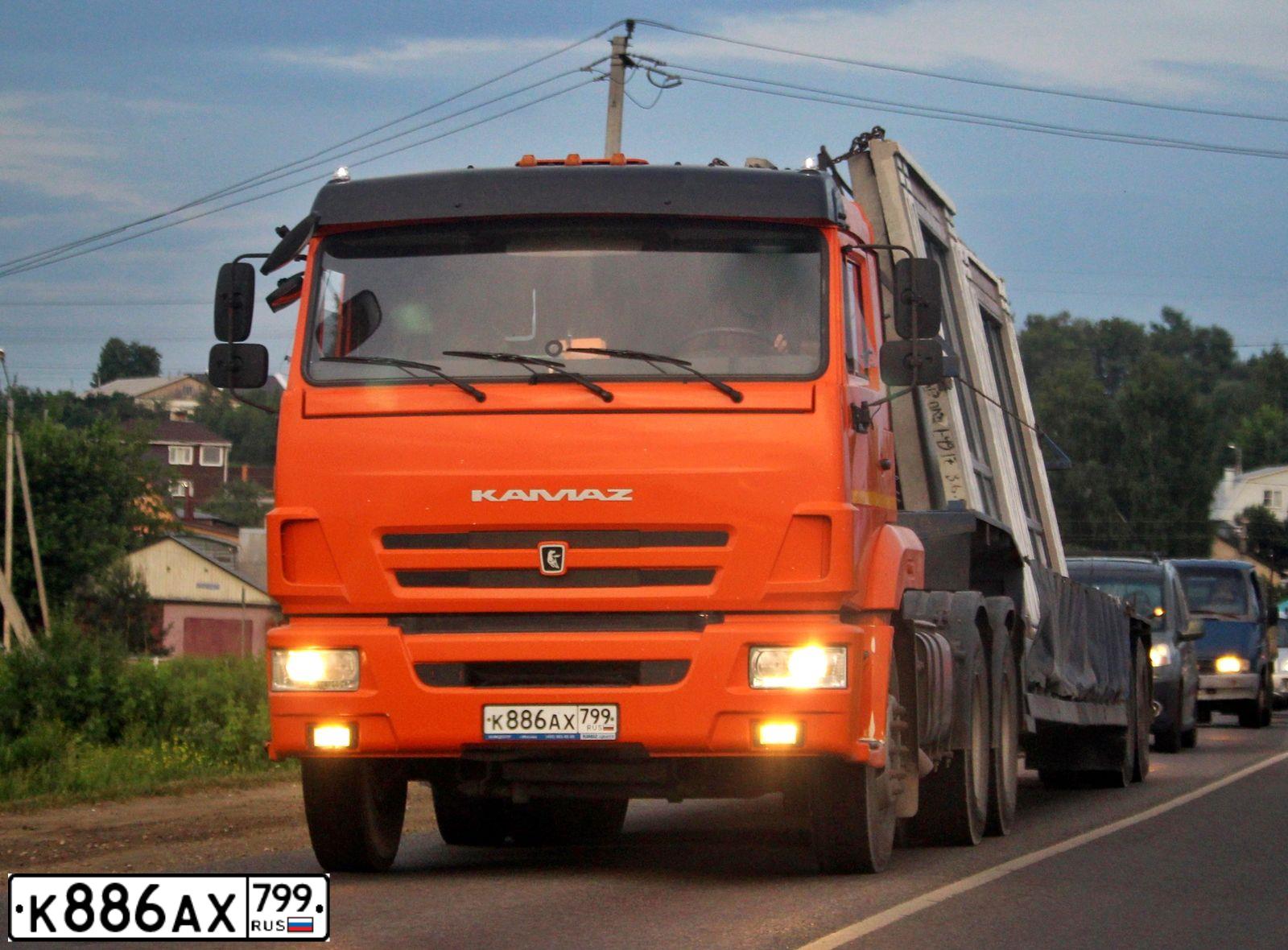 Фото автомобиля KAMAZ 65116 /6X4/, 2017 — госномер К886АХ799. Цвет: Оранжевый RAL 2009