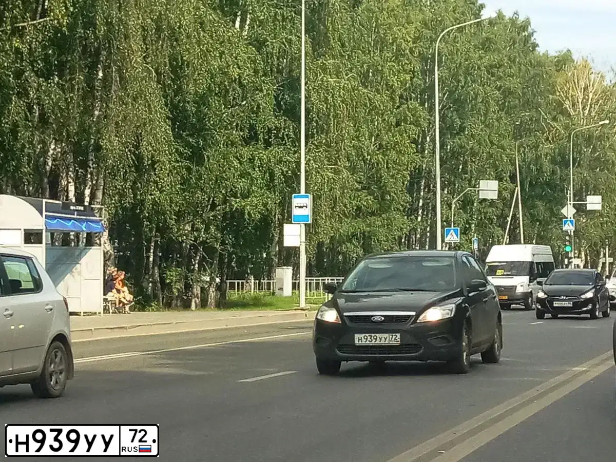 Фото автомобиля FORD FOCUS, 2011 — госномер Н939УУ72. Цвет: ЧЕРНЫЙ