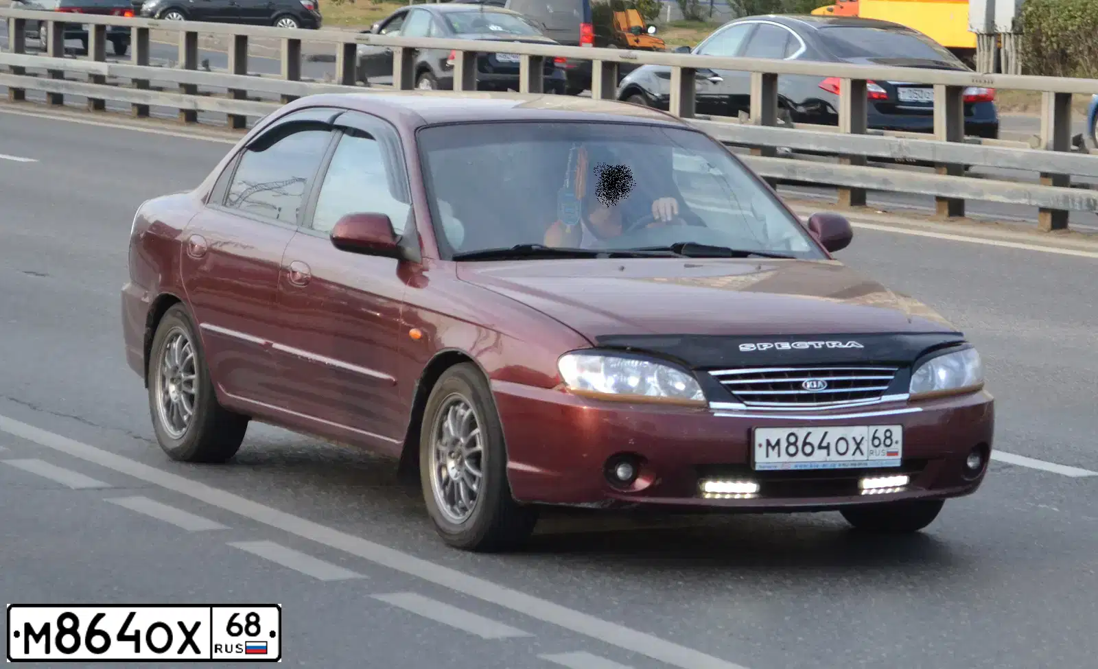 Фото автомобиля KIA SPECTRA, 2006 — госномер М864ОХ68. Цвет: КРАСНЫЙ ПЕРЕЦ (КРАСНЫЙ)