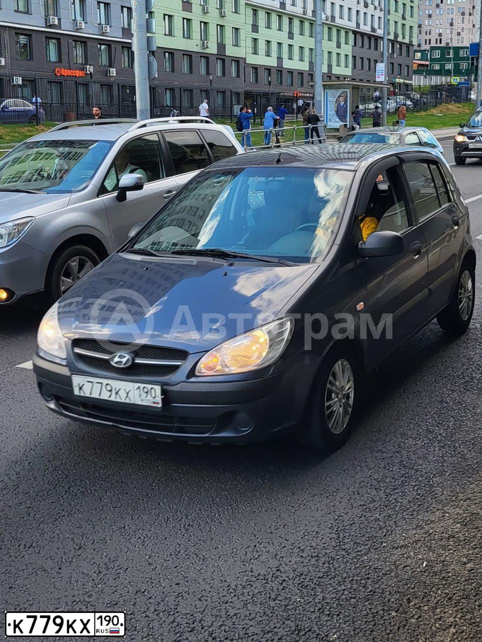 Фото автомобиля HYUNDAI GETZ, 2010 — госномер К779КХ190. Цвет: СЕРЫЙ ТЕМНЫЙ