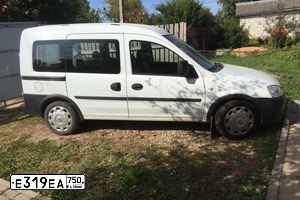 Фото автомобиля OPEL COMBO, 2010 — госномер Е319ЕА750. Цвет: Белый