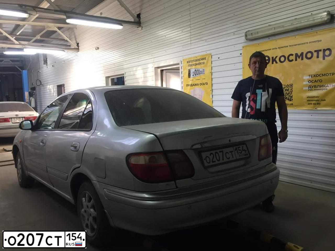Фото автомобиля NISSAN SUNNY, 2001 — госномер О207СТ154. Цвет: СЕРЕБРИСТЫЙ