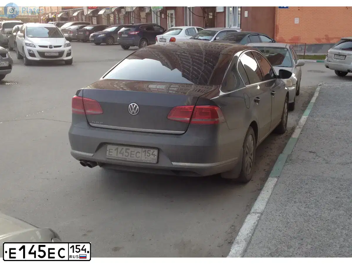 Фото автомобиля ФОЛЬКСВАГЕН ПАССАТ, 2011 — госномер Н155УМ154. Цвет: ЧЕРНО-СЕРЫЙ