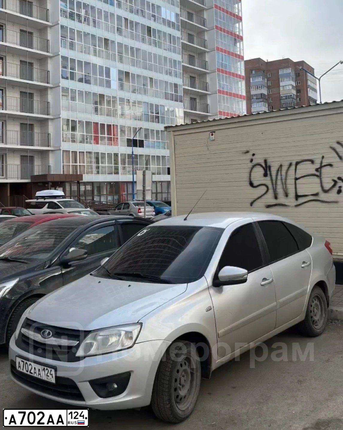 Фото автомобиля LADA 2114 SAMARA, 2012 — госномер А702АА124. Цвет: Белый