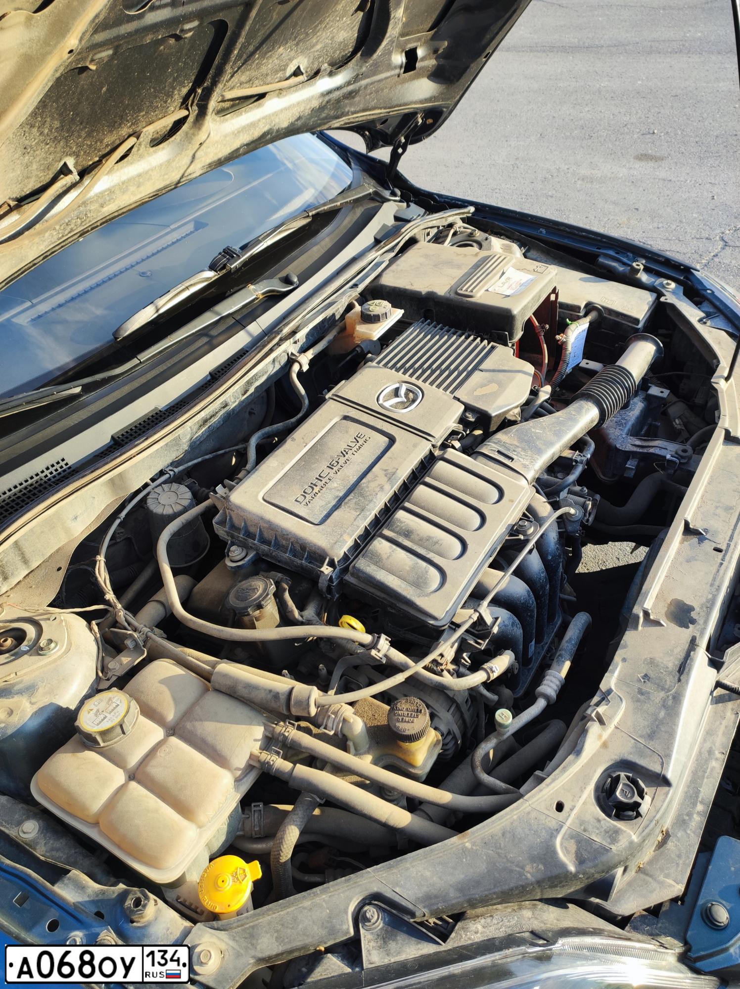 Фото автомобиля MAZDA 3, 2008 — госномер Е758ВЕ11. Цвет: Серый