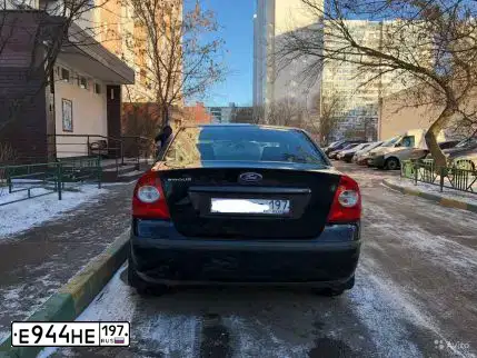 Фото автомобиля FORD FOCUS, 2011 — госномер Е944НЕ197. Цвет: ТЕМНО-СЕРЫЙ