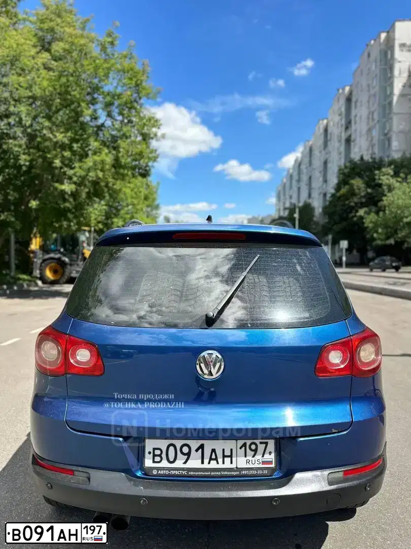 Фото автомобиля VOLKSWAGEN TIGUAN, 2010. Цвет: синий