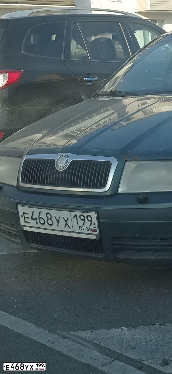 Фото автомобиля SKODA OCTAVIA, 2006 — госномер Е468УХ199. Цвет: ЗЕЛЕНЫЙ