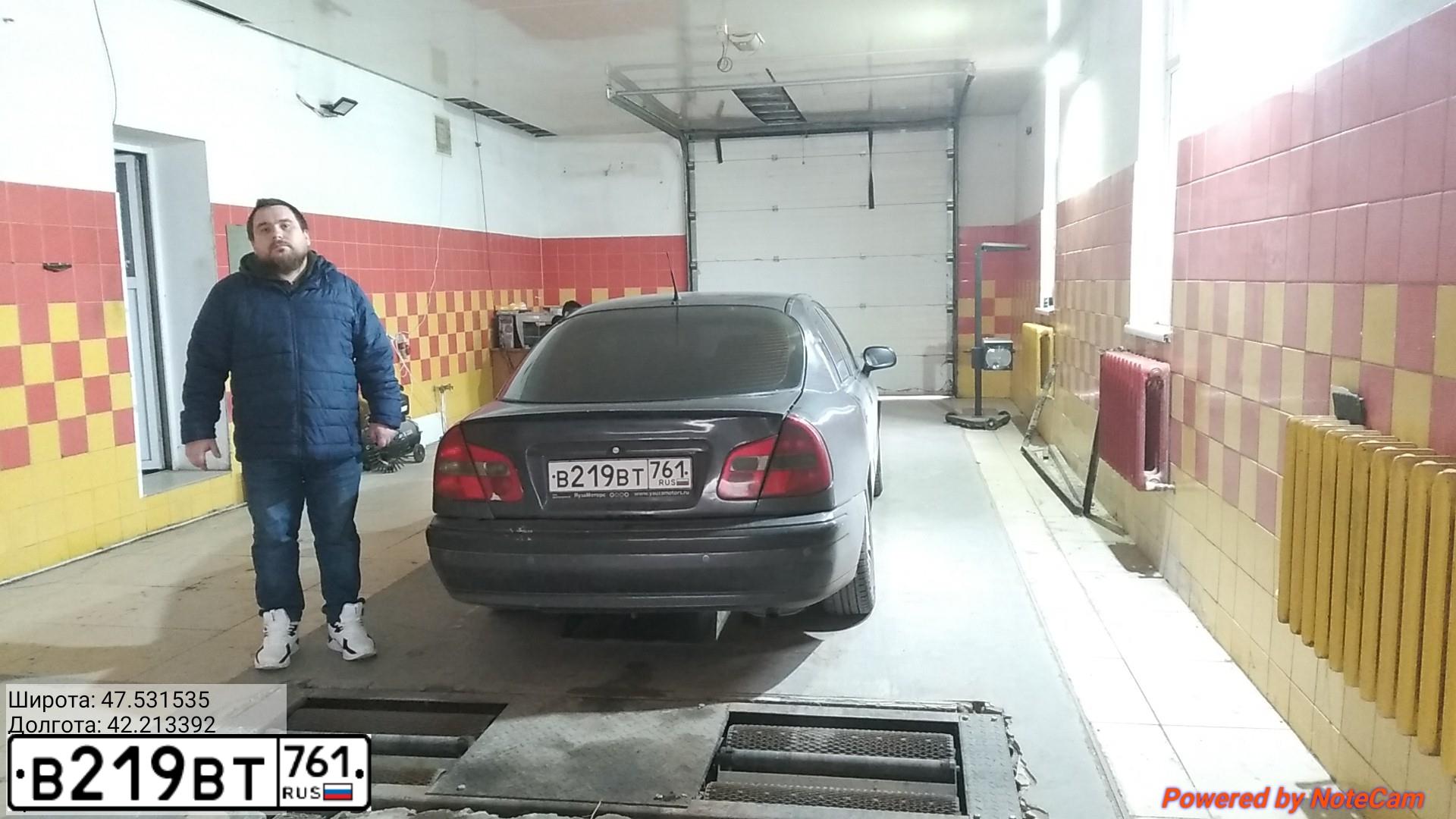 Фото автомобиля MITSUBISHI CARISMA, 2002 — госномер В767ХН99. Цвет: Серый