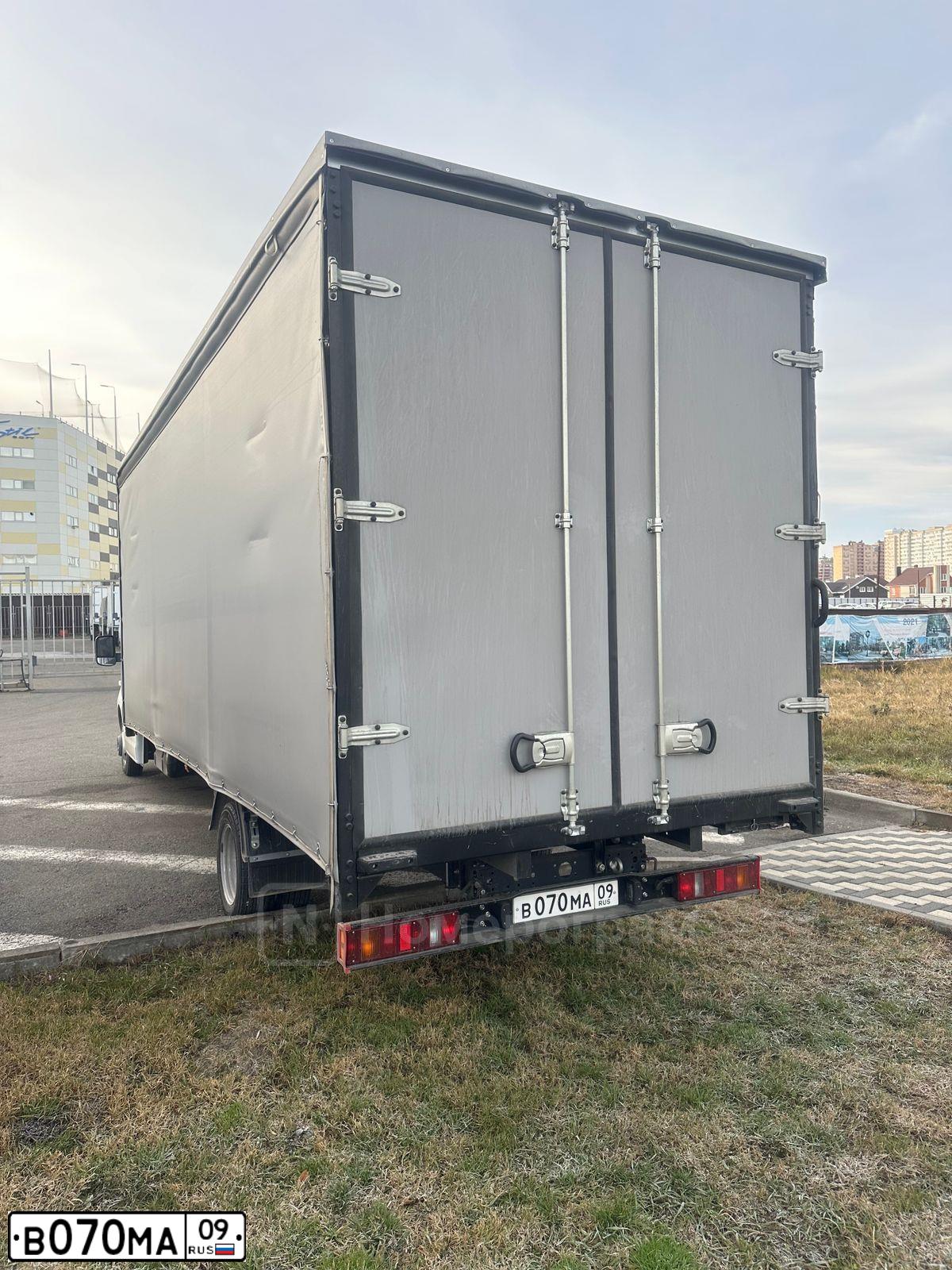 Фото автомобиля CHEVROLET NIVA, 2012 — госномер Т080АЕ07. Цвет: Черно-синий металлик