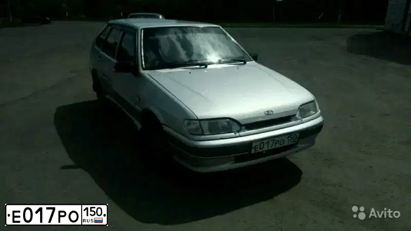 Фото автомобиля LADA 2114 SAMARA, 2004 — госномер М935СХ62. Цвет: СЕРЫЙ СВЕТЛЫЙ