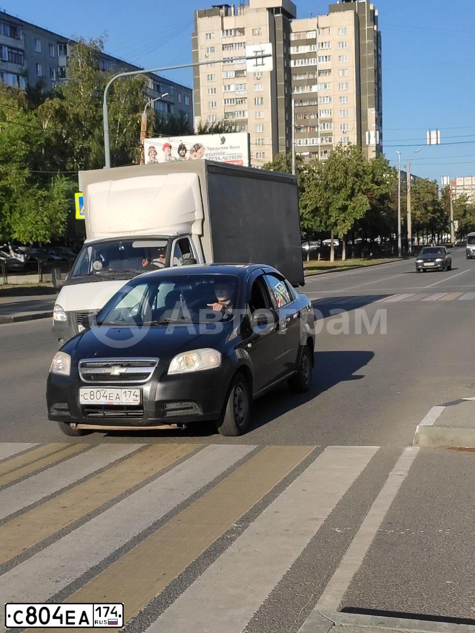 Фото автомобиля CHEVROLET AVEO, 2008 — госномер С804ЕА174. Цвет: ЧЕРНЫЙ