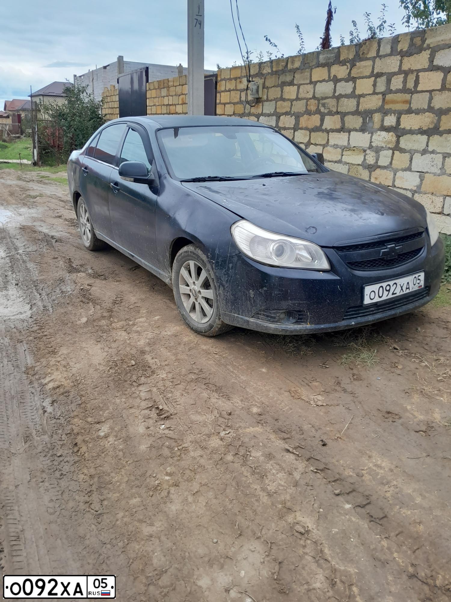 Фото автомобиля CHEVROLET EPICA, 2010 — госномер О092ХА05. Цвет: ЖЕЛТЫЙ