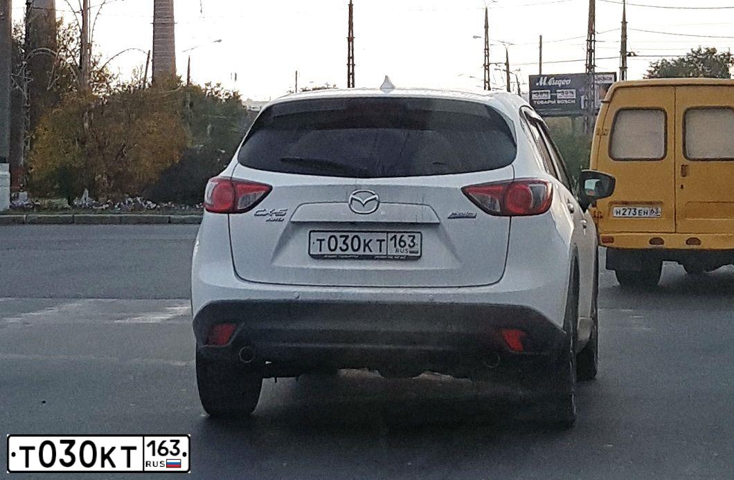 Фото автомобиля MAZDA 3, 2013 — госномер Т030КТ163. Цвет: КОРИЧНЕВЫЙ