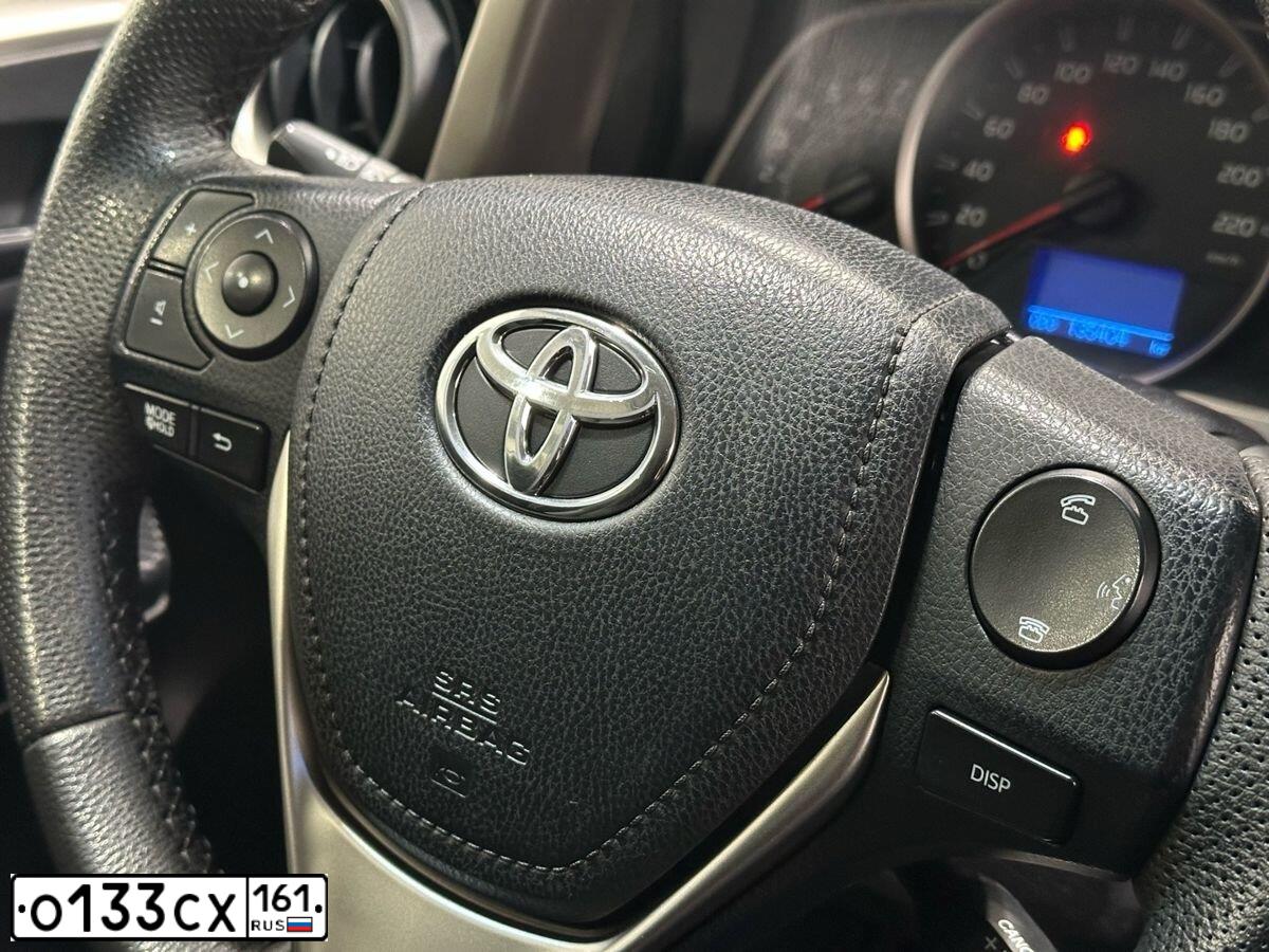 Фото автомобиля TOYOTA RAV4, 2013 — госномер О133СХ161. Цвет: бронзовый