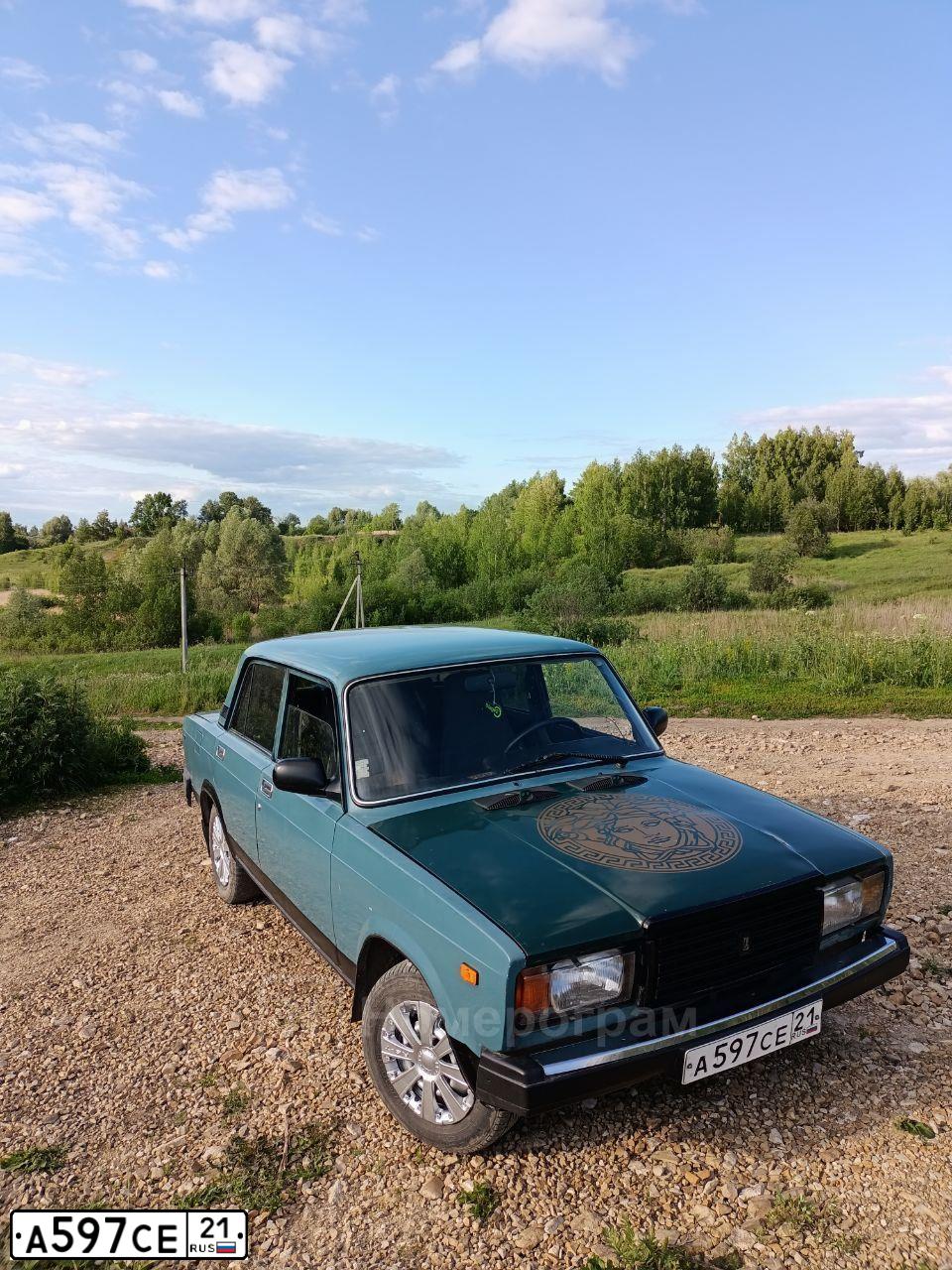 Фото автомобиля LADA 2107, 2003 — госномер А597СЕ21. Цвет: СЕРО-СИНИЙ