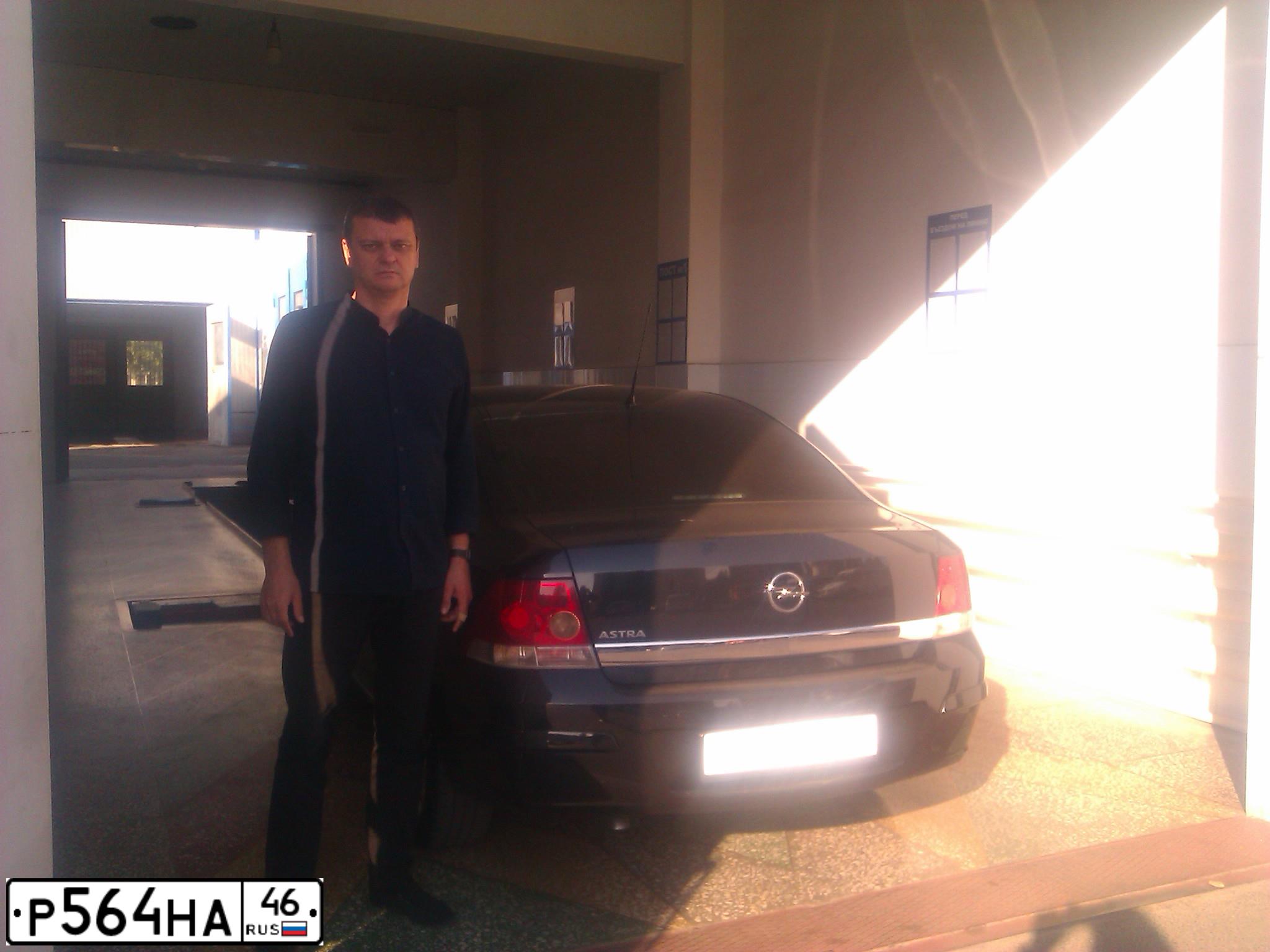 Фото автомобиля OPEL ASTRA, 2012 — госномер Р564НА46. Цвет: ЧЕРНЫЙ